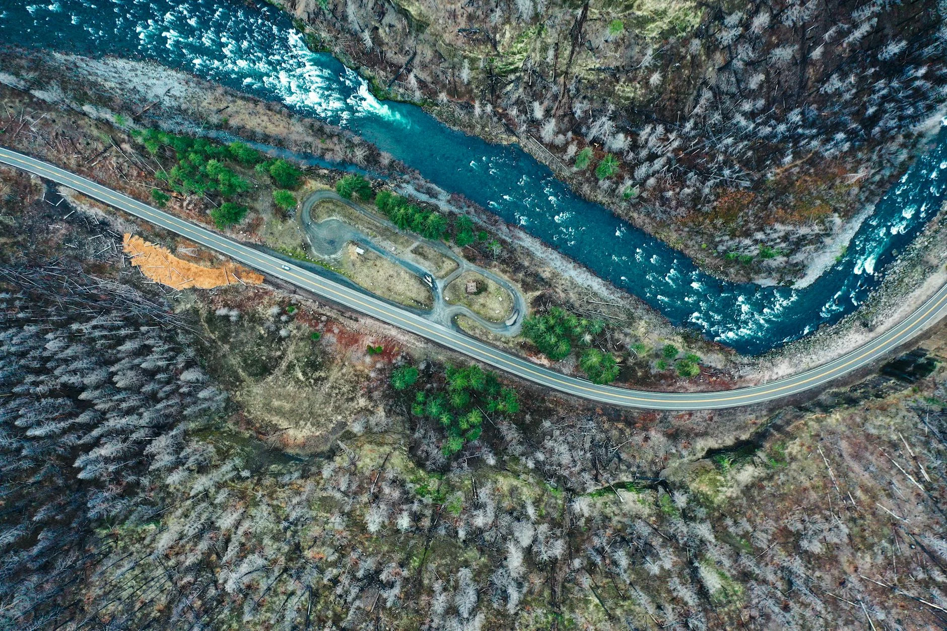 The valley narrows - road following the Devils River into remote country